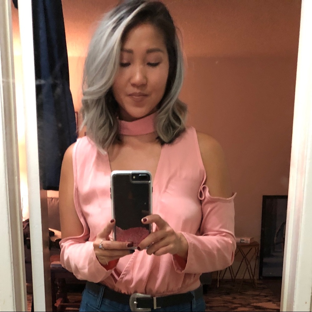 Pink body suit